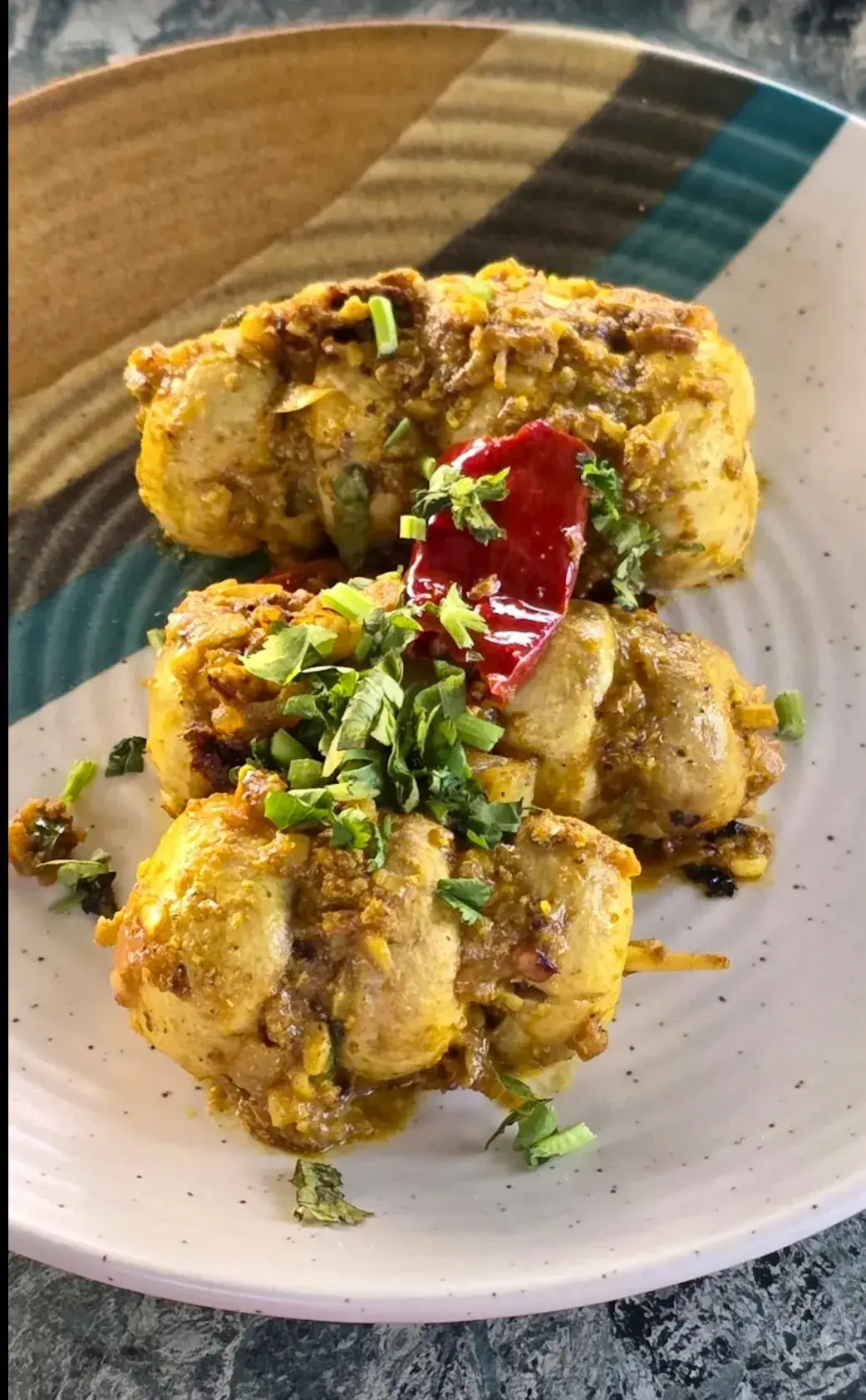 Battered florets tossed with curry leaves and red chilli.